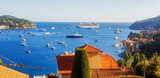 Fantastic Rade De Villefranche-sur-Mer ith anchored sailboats, yachts and cruise ship!