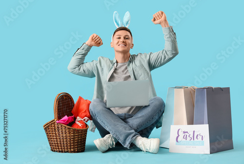 Happy young man with bunny ...