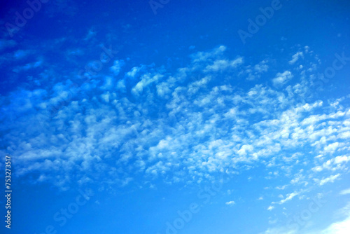 Drawing sky with tiny bright white clouds