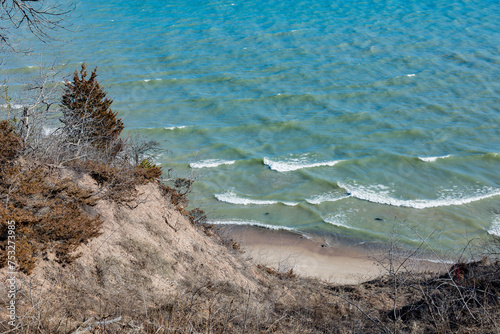 A bluff overlooking Lake Michigan in the early spring with erosion. 