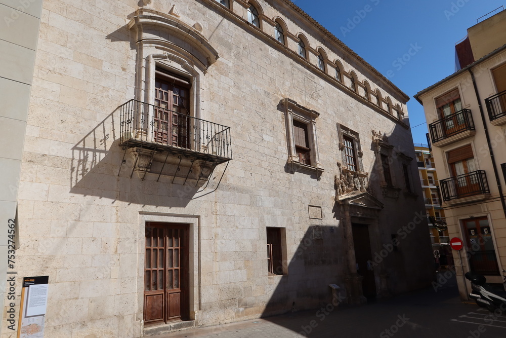 Villena, Alicante, Spain, March 5, 2024: One of the medieval facades of the town hall in the Plaza de Santiago in Villena, Alicante, Spain