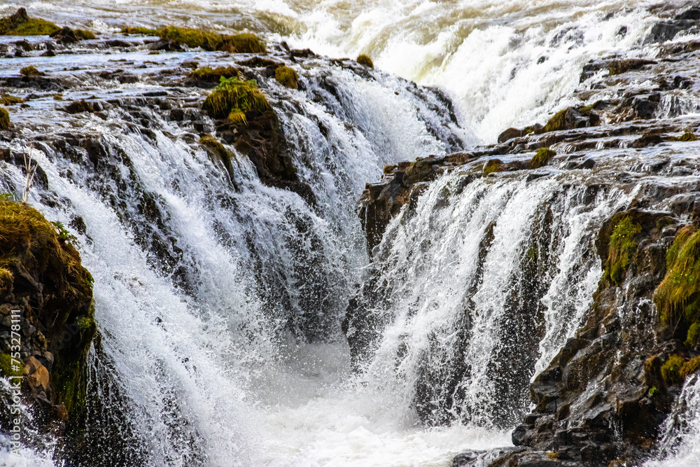 A waterfall in Iceland in Scandinavia in northern Europe, in the land of fire and ice, A waterfall in Iceland in Scandinavia in northern Europe, in the land of fire and ice,