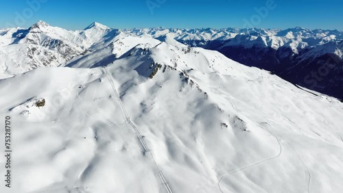 The ski area on the Motta Naluns mountain in Scuol, Switzerland on a sunny winter day. photo