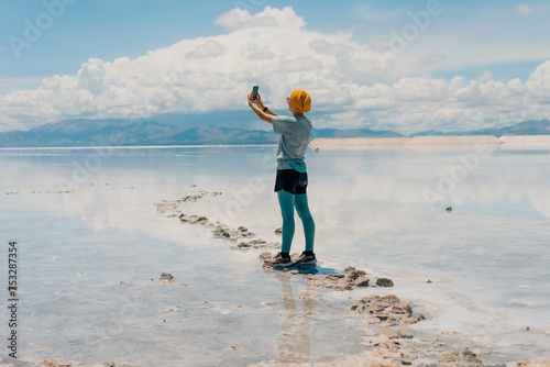 tourist on Pools in Salinas Grandes, Jujuy, Argentina - mar 2th 2024 photo