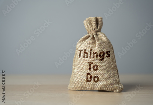 A bag of things to do. Career milestones, personal ambitions, setting goals creates a roadmap for success. Fulfilling goals. Performing tasks. Planning ahead
