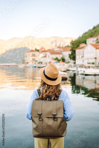 A woman tourist walks and enjoys the views and attractions. Travelling, lifestyle, adventure.