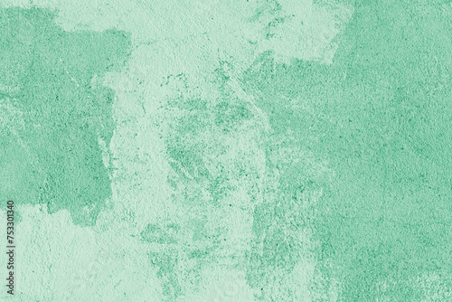Old stucco plaster surface, concrete wall background, close up grunge texture of green painted cement texture. Wallpaper, backdrop, architecture design element