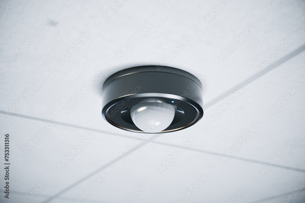 Advanced Ceiling-Mounted Motion Sensor in a High-Tech Office Space