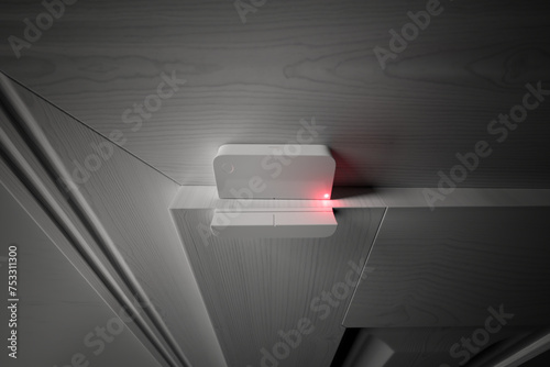 Advanced Wall-Mounted Security System with Active Red Scanning Light