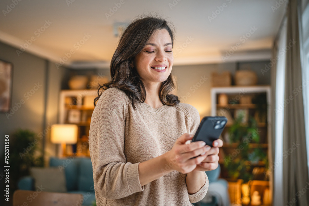 One woman mature caucasian female use mobile smart phone sms texting One woman mature caucasian female use mobile smart phone sms texting