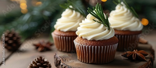 Gingerbread cupcake with rosemary decoration. Homemade pastry dessert.