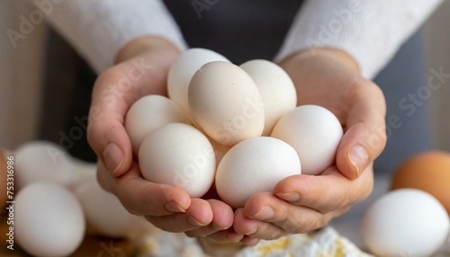 Chicken eggs in hands. Selective focus.