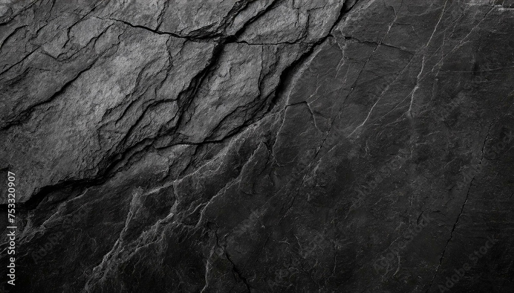 Rock texture with cracks,black stone background with copy space for design. Rock texture with cracks,black stone background with copy space for design.