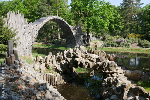 Rakotzbrücke im Azaleenpark und Rhododendronpark Kromlauer Park und weitere Gartenkunst aus Säulenbasalt photo