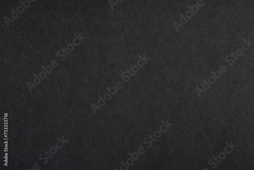 A sheet of black cardboard texture as background 