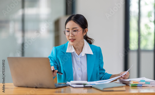 Business Documents, Auditor businesswoman checking searching document legal prepare paperwork or report for analysis TAX time,accountant Documents data contract partner deal in workplace office 