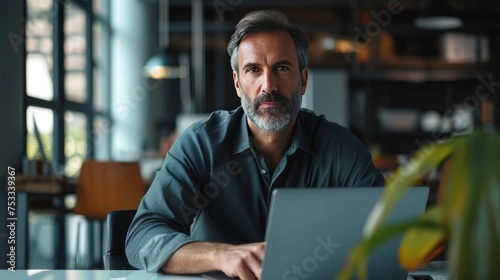 Man works on a laptop 