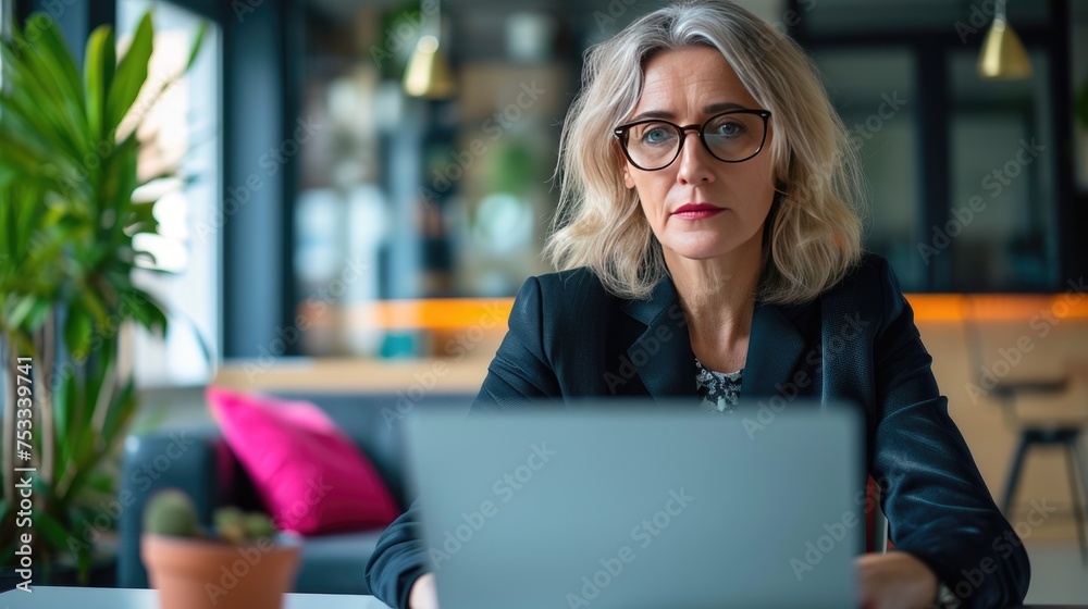 Woman works on a laptop Woman works on a laptop