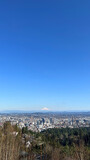 View of Portland, Oregon with snow covering Mt. Hood on a sunny day.