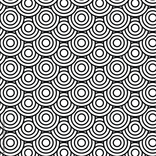 Black and white overlapping circle pattern. 