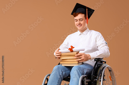 Male graduate in wheelchair...