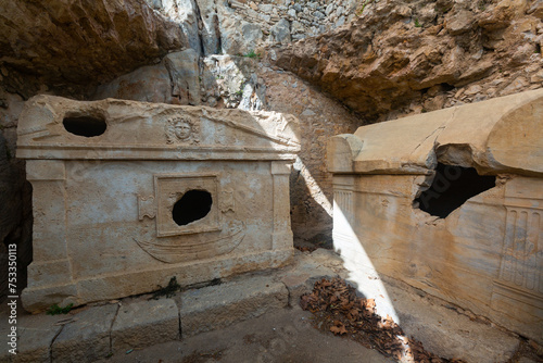 Antique stone sarcophagus in tomb of captain Eudemos in ancient Lycian city of Olympus, Kumluca district, Antalya Province, Turkey.. photo