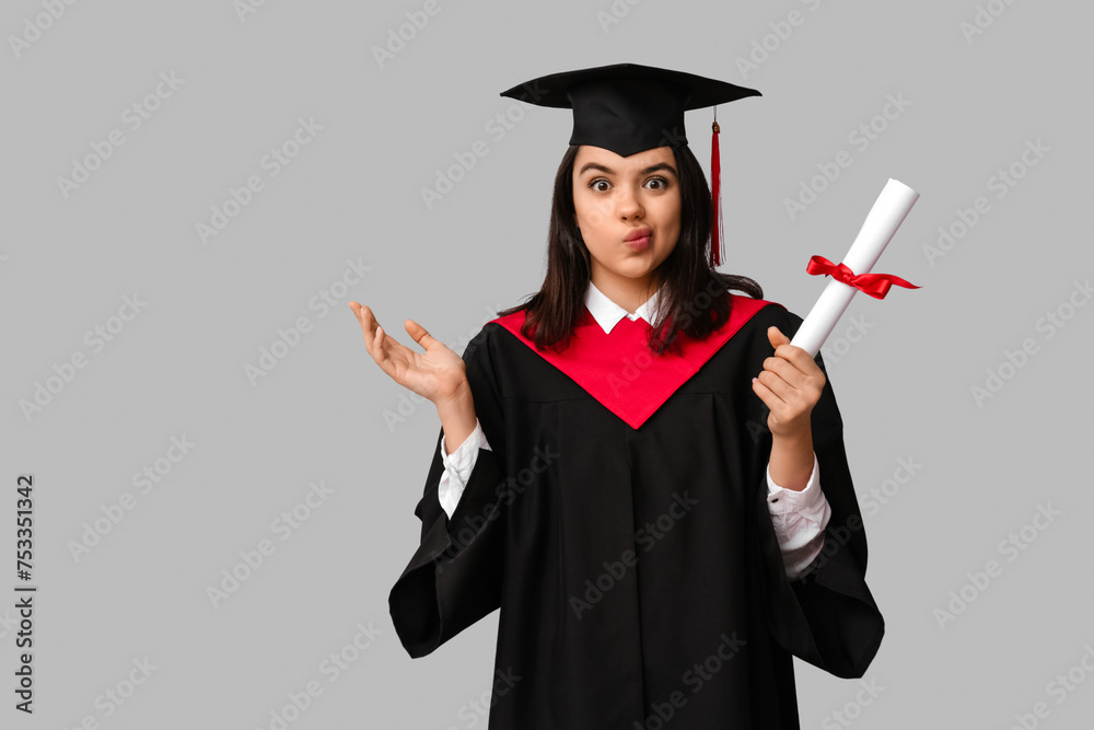 Emotional female graduating student with diploma on white background Emotional female graduating student with diploma on white background
