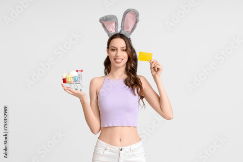 Young woman in bunny ears h...