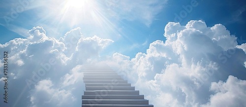 Cloudy stairway leading up to heavenly with toward the light blue sky
