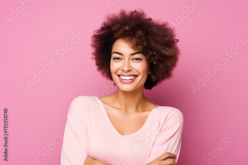 photo of woman smiling in front of pink background, women's health and beauty,