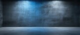 Empty dark concrete room studio background with blue soft lighting showcasing products and text on the free space cement wall