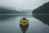 Lake minimalism a single canoe on still water
