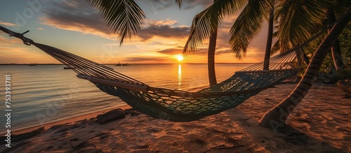 hammocks on the beach for beach visitors to relax © Beny