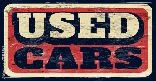 Aged vintage used cars sign on wood