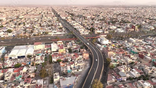 Slow motion drone footage of the Mexico City Metropolitan Area, showcasing Ecatepec