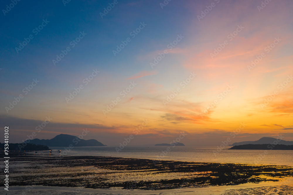 Aerial view colorful cloud at sunrise above the ocean. .Majestic sunset or sunrise landscape Amazing light of nature amazing cloud scape sky and colorful clouds moving away rolling.