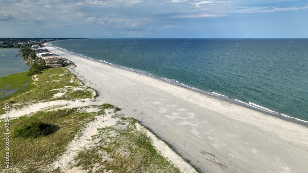 South Carolina coastal beach by the ocean at Pawleys Island, SC a summertime vacation destination for family South Carolina coastal beach by the ocean at Pawleys Island, SC a summertime vacation destination for family