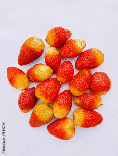 Fresh strawberries ripe red strawberry heap garden-strawberry pile juicy sweet stroberee fruit food plant fruits fleshy fraise fresa morango fragaria ananassa berry closeup image stock photo.
 photo