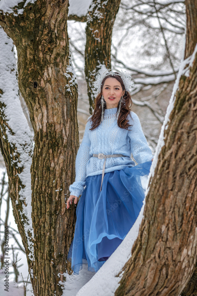 Princess Snow White in the winter forest. Fairy-tale character in bright outfits. A sweet and modern story with emotions. Princess Snow White in the winter forest. Fairy-tale character in bright outfits. A sweet and modern story with emotions.