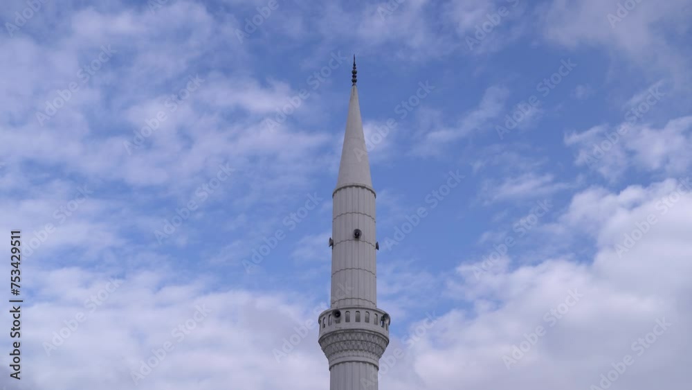 Mosque minaret and cloudy sky in the background 4K Mosque minaret and cloudy sky in the background 4K