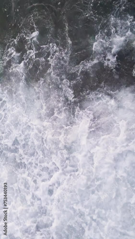 Sea wave with splashes on the beautiful beach. Vertical video. Sea wave with splashes on the beautiful beach. Vertical video.