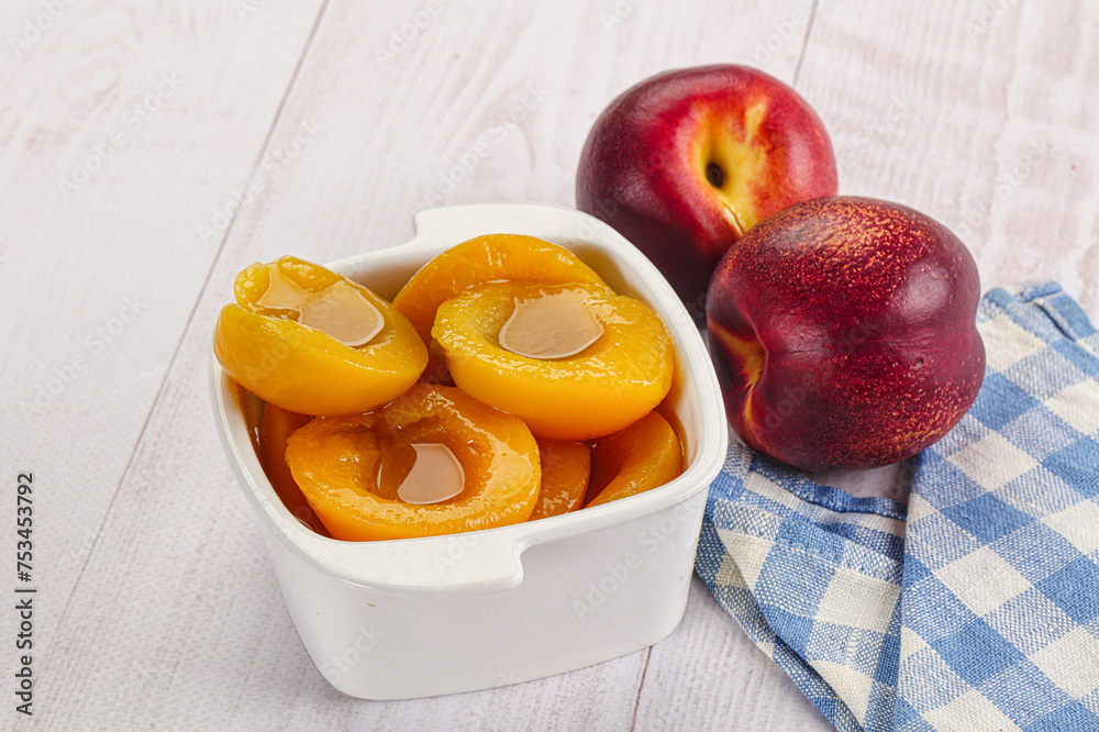 Canned peaches with sweet syrope Canned peaches with sweet syrope