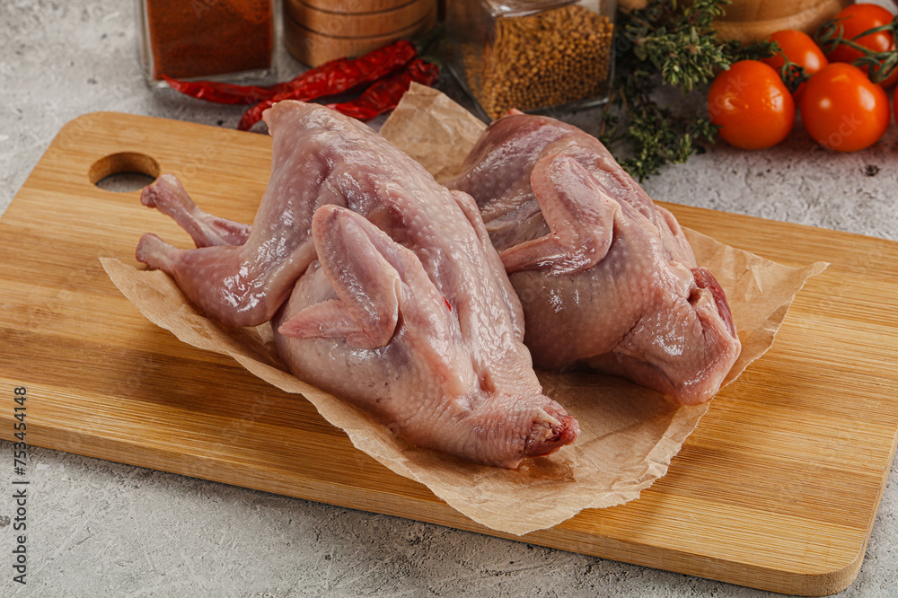 Raw gurmet quail bird preparation