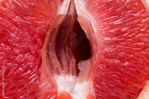 Red grapefruit looking like female vulva and vagina, vaginal opening