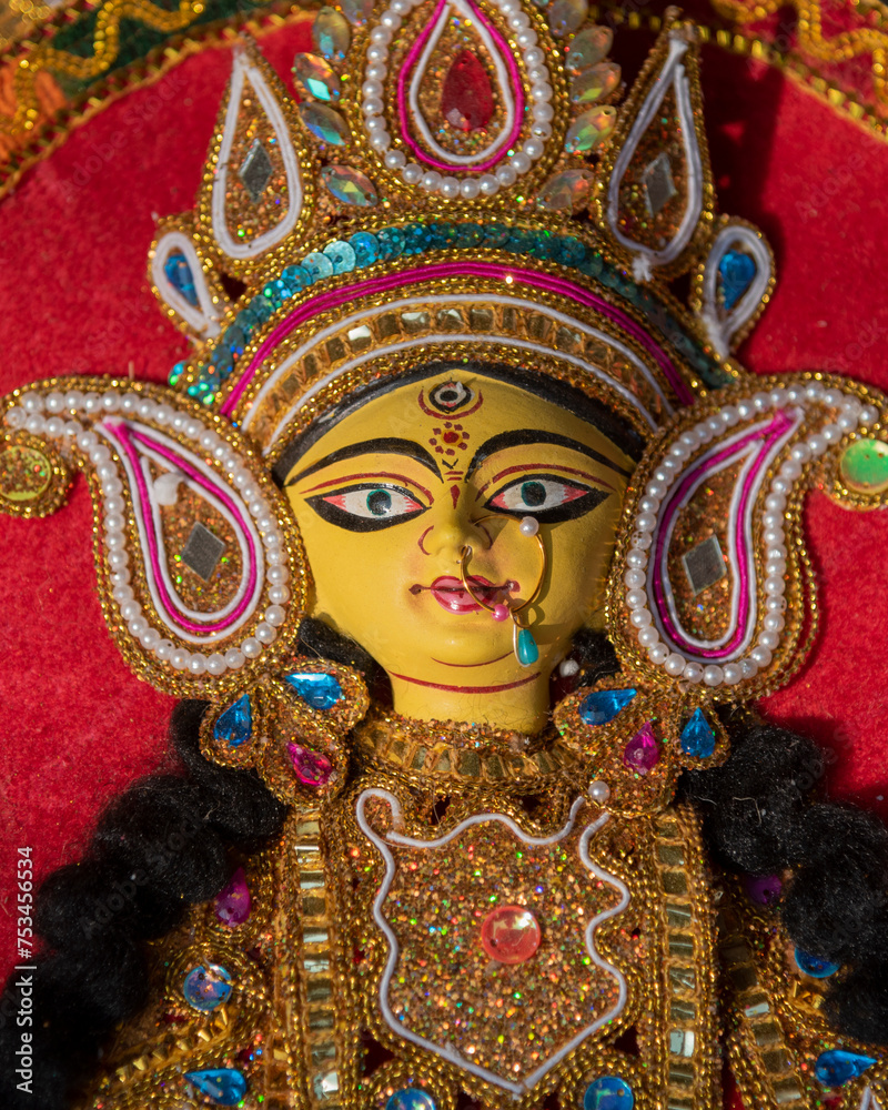 Decorated idol of Hindu Goddess Durga. Close up. Decorated idol of Hindu Goddess Durga. Close up.