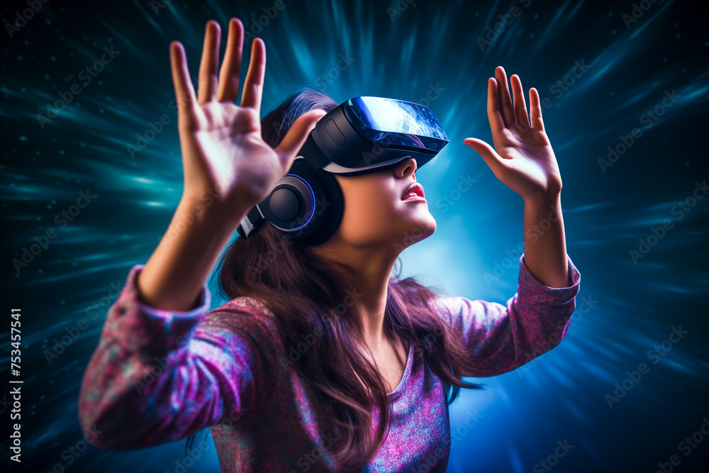 Beautiful girl in virtual reality glasses touches the air with her hand Beautiful girl in virtual reality glasses touches the air with her hand