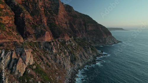 Chapman's Peak Drive, Carved On Steep Cliffs In Cape Town, South Africa. Aerial Drone Shot  photo