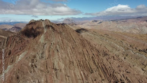 Rugged rock strata on edge, rustic Canon del Indio canyon in Argentina photo