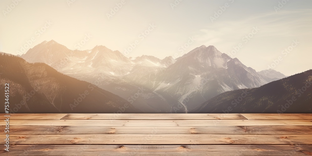Vintage-style concept: Mountain backdrop with an empty wooden table provides ample free space for showcasing products and branding in a soft, blurred setting.