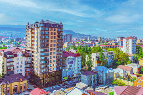 Tableau sur toile View of the city of Makhachkala in the Republic of Dagestan against a background of blue sky and morning fog